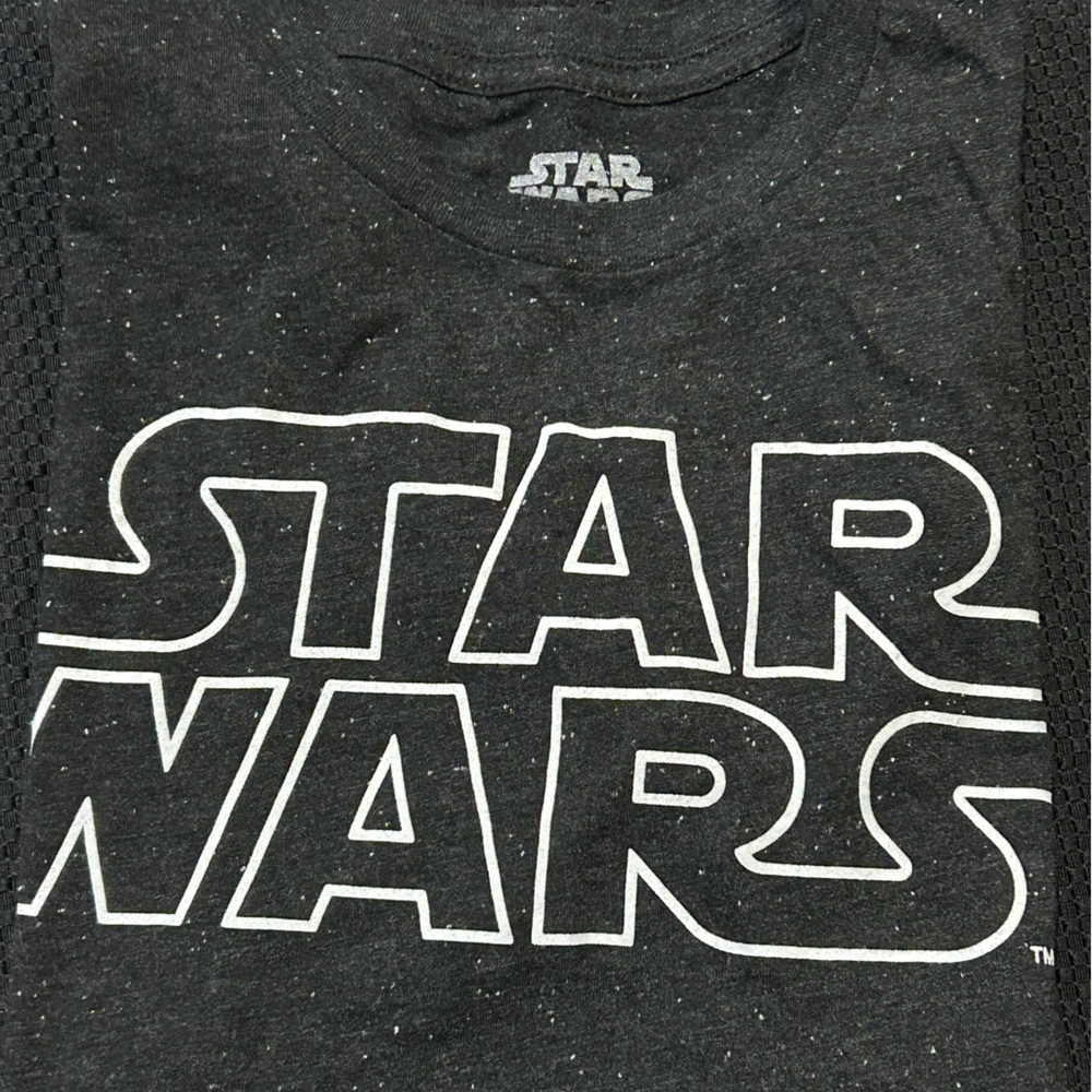 Star Wars black with white speckled short-sleeve t-shirt; size Small.